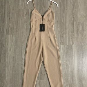 Tan ribbed jumpsuit. Size small